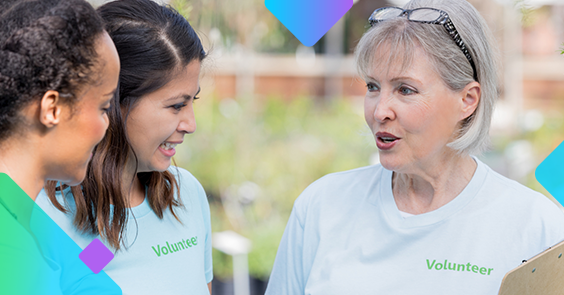 Three women volunteers talking